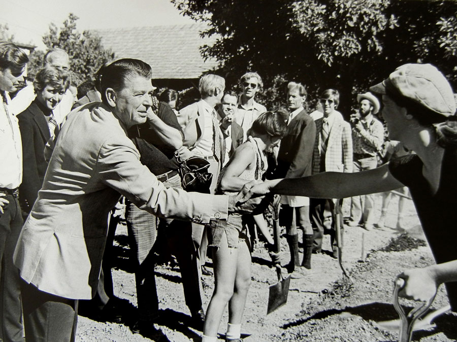 Governor Ronald Reagan greats an apprentice at the Alan Chadwick Garden in Covelo