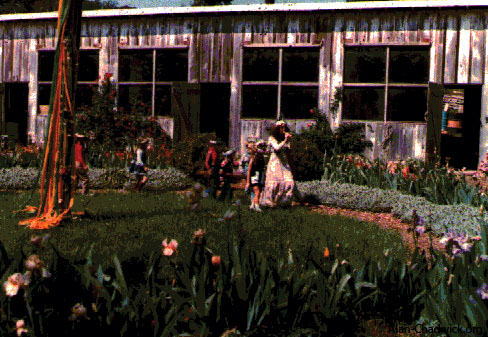 A procession begins the festivities at the traditional May Day festival.